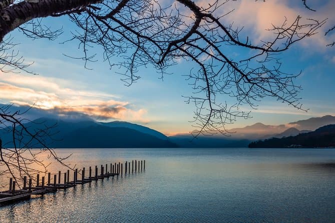 Lake Chuzenji with a wooden pier at sunset