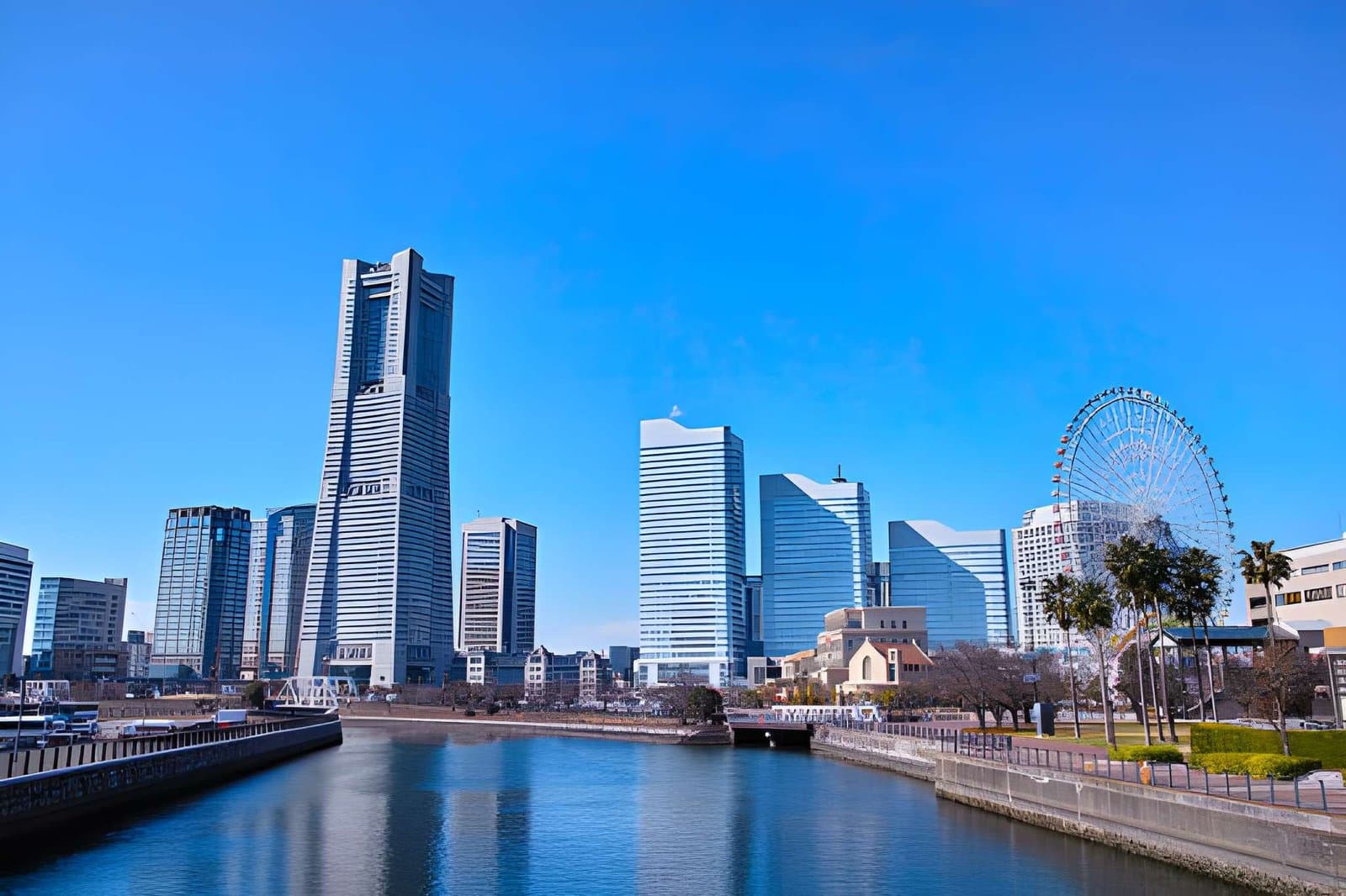 Scenic view of Yokohama city skyline from a lush garden on private tour